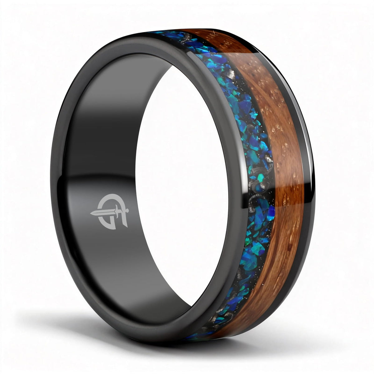 Flat black ceramic ring with brown whiskey barrel wood beside blue natural opal and silver-gray meteorite