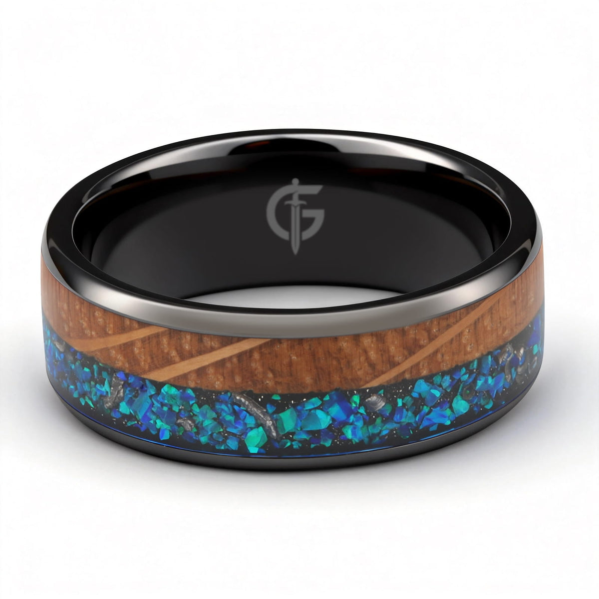 Flat black ceramic ring with brown whiskey barrel wood beside blue natural opal and silver-gray meteorite