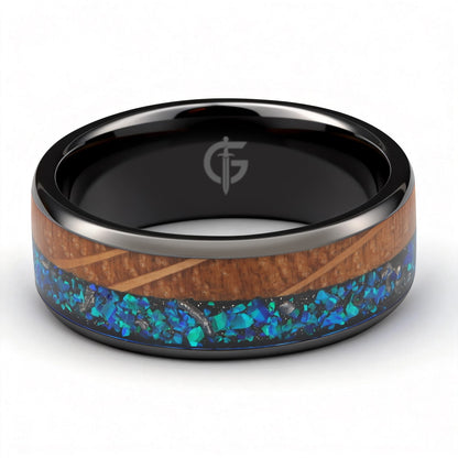 Flat black ceramic ring with brown whiskey barrel wood beside blue natural opal and silver-gray meteorite