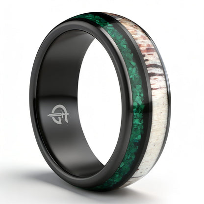 Rounded black ceramic ring with separate green malachite and pale, brown-marked deer antler inlays