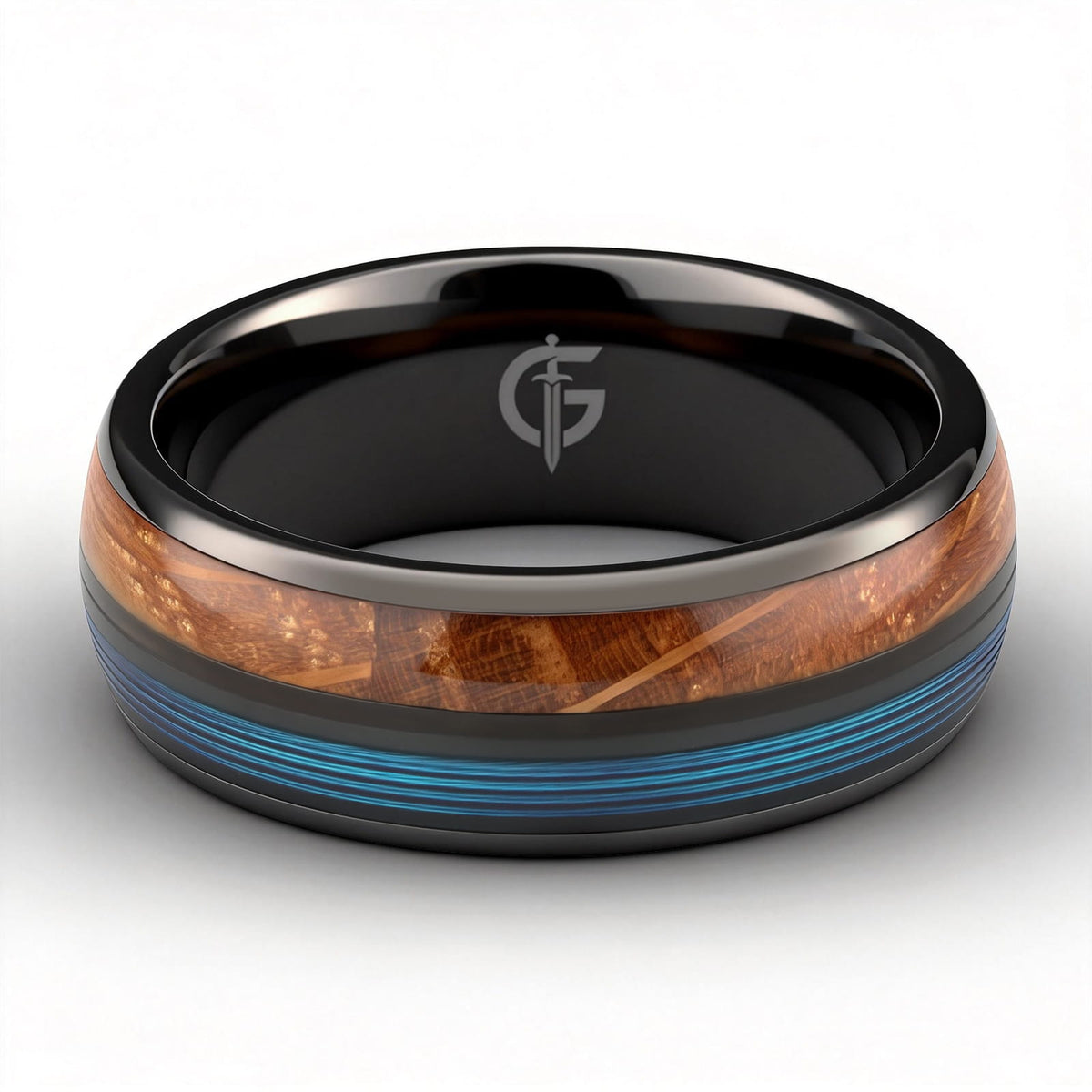 Black ceramic ring with brown whiskey barrel wood and blue fishing line inlays separated by a black strip.