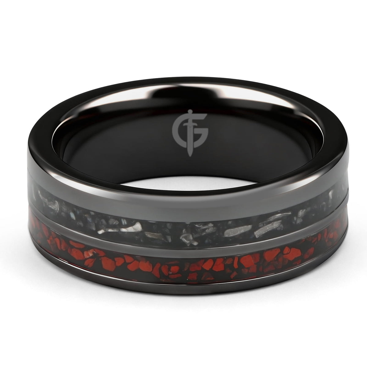 Flat black ceramic ring with red agate and dinosaur bone beside silver-gray meteorite and black agate