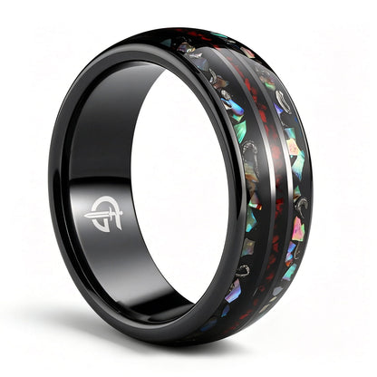 Black ceramic ring with red dinosaur bone center between two iridescent abalone shell and silver-gray meteorite bands.