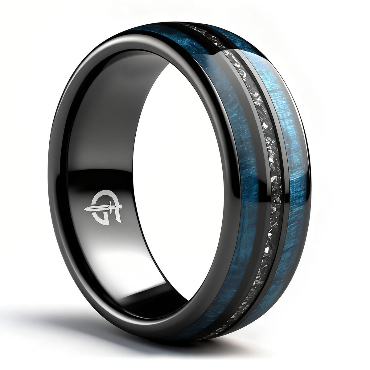Polished black ceramic ring with two blue whiskey barrel wood bands framing silver-gray Gibeon meteorite fragments.