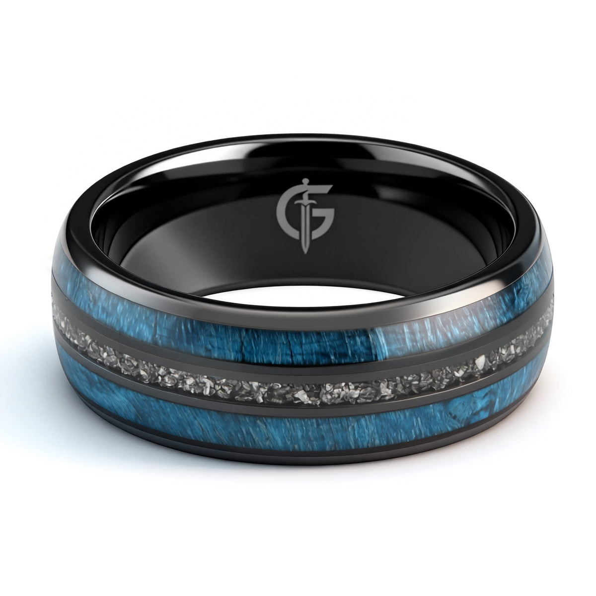 Polished black ceramic ring with two blue whiskey barrel wood bands framing silver-gray Gibeon meteorite fragments.