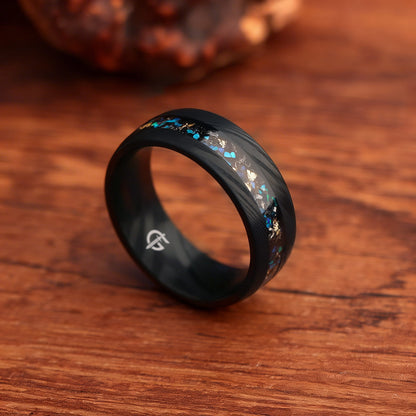 Black Damascus steel ring with a narrow inlay of meteorite, Ocean Blue natural opal and gold leaf