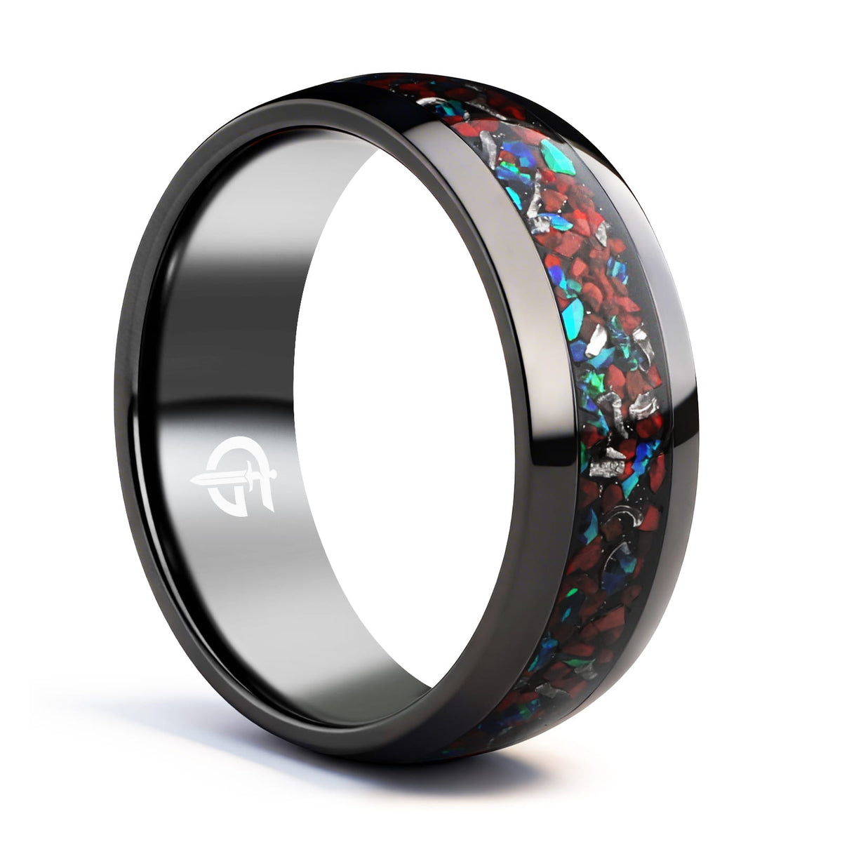 Polished black titanium ring with a mixed inlay of red, blue-green and silver-gray fragments.