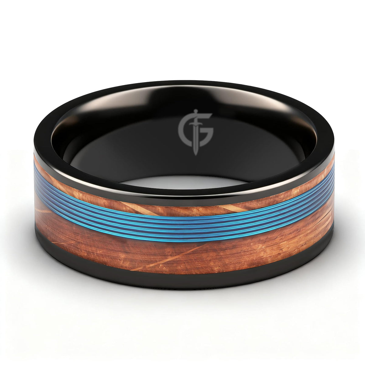 Black titanium ring with blue fishing line centered between brown whiskey barrel wood bands