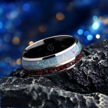 Titanium ring with black interior, lavender-green natural opal and a separate red-and-gray meteorite and dinosaur bone inlay