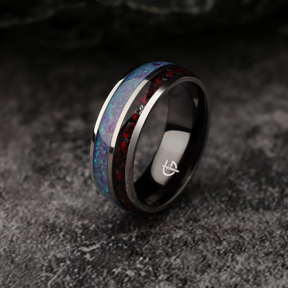 Titanium ring with black interior, lavender-green natural opal and a separate red-and-gray meteorite and dinosaur bone inlay
