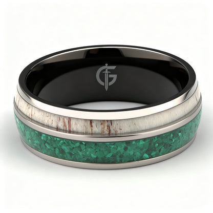 Titanium ring with black interior, green malachite and pale deer antler in separate inlay channels