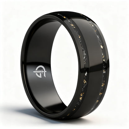 Black titanium ring with a broad polished center and two narrow meteorite and gold leaf inlays
