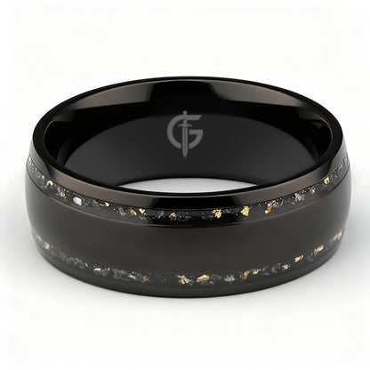 Black titanium ring with a broad polished center and two narrow meteorite and gold leaf inlays