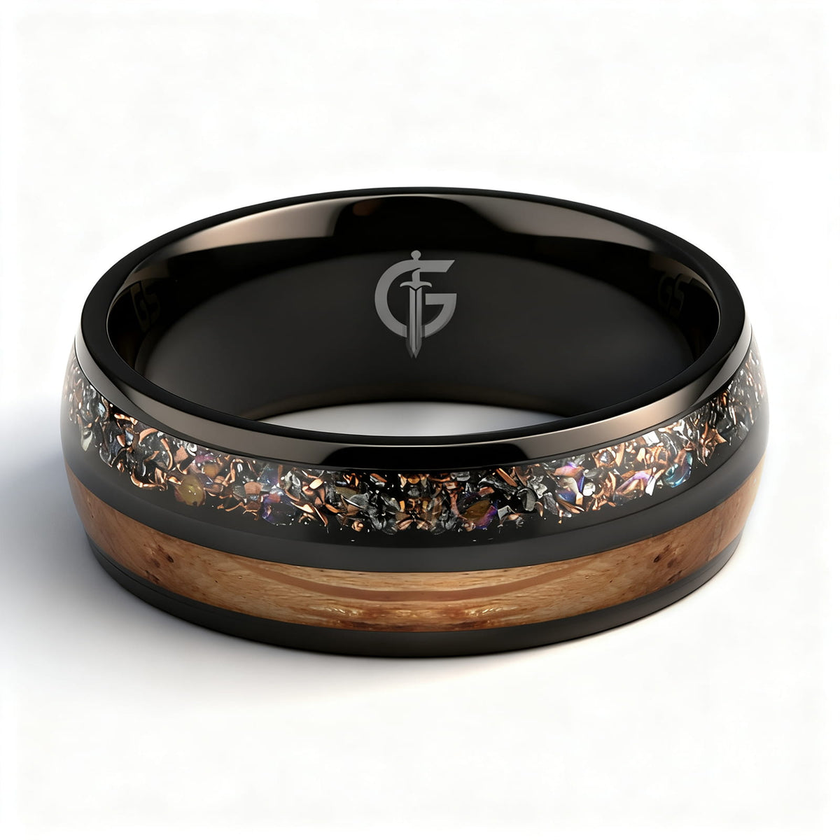 Black titanium ring with whiskey barrel wood beside a silver-gray meteorite, moonstone and copper inlay.