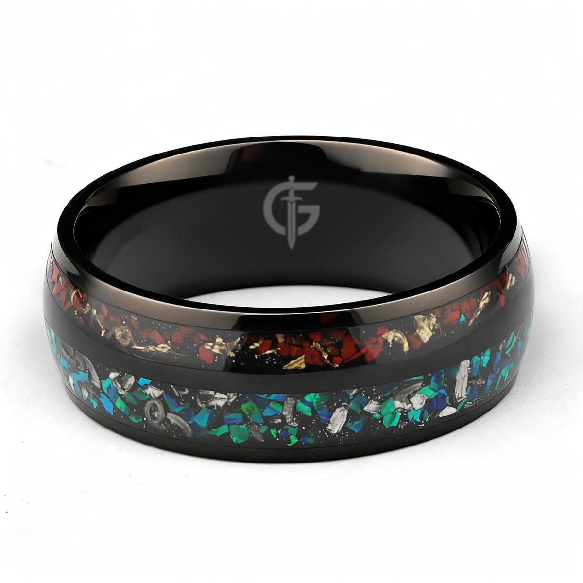Black titanium ring with two inlays: blue-green opal and meteorite beside reddish-brown bone and copper.