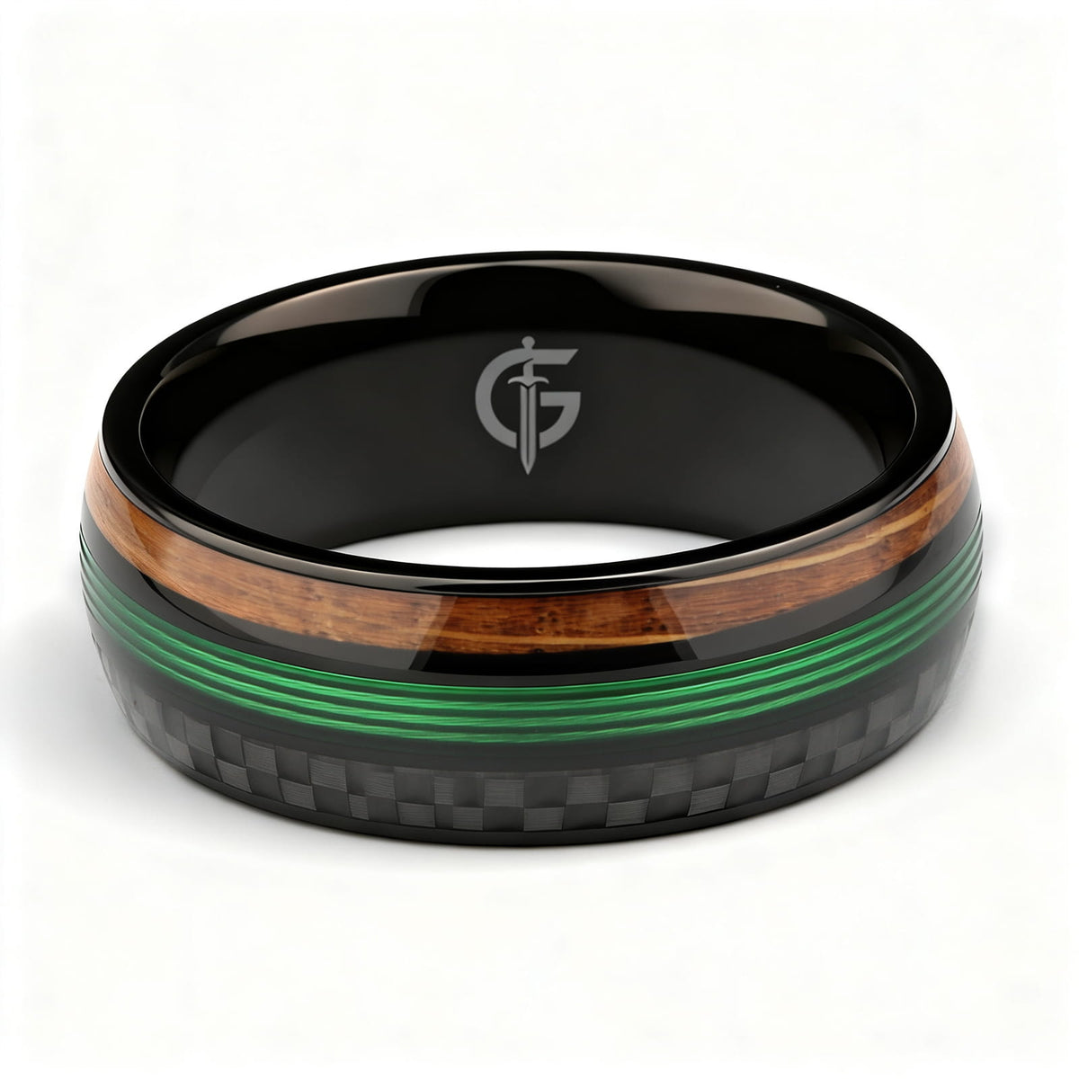 Black titanium ring with green fishing line between brown whiskey barrel wood and black carbon fiber