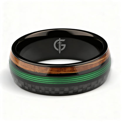 Black titanium ring with green fishing line between brown whiskey barrel wood and black carbon fiber