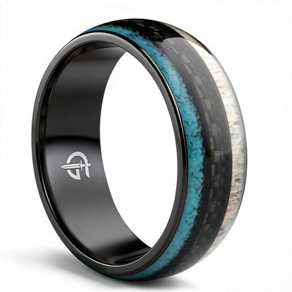 Black titanium ring with pale deer antler and blue turquoise flanking a black carbon fiber center