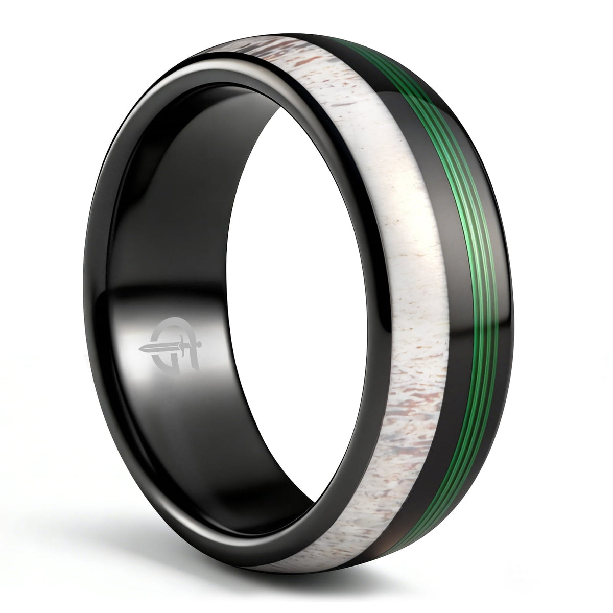 Polished black tungsten ring with pale deer antler beside parallel green fishing line strands