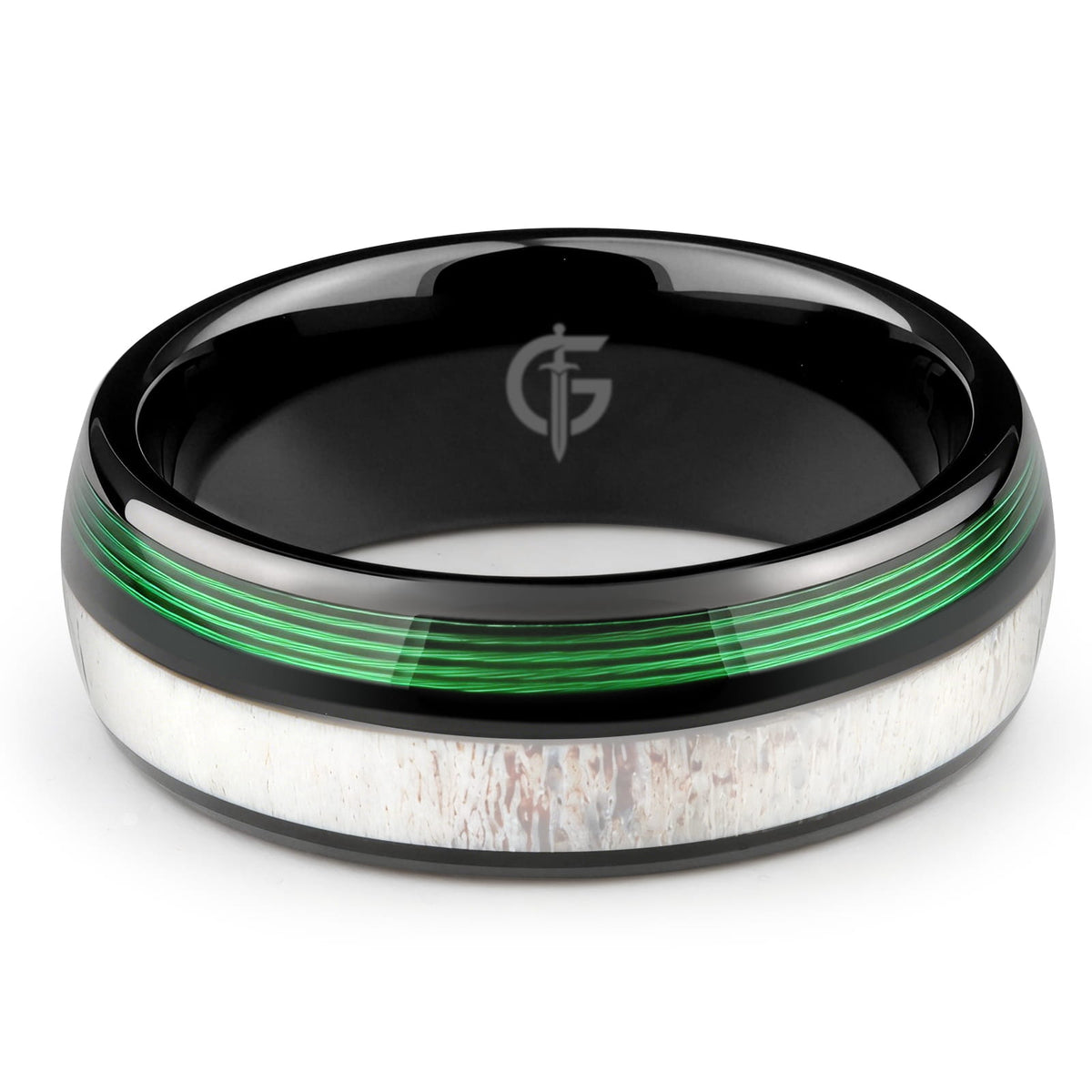 Polished black tungsten ring with pale deer antler beside parallel green fishing line strands