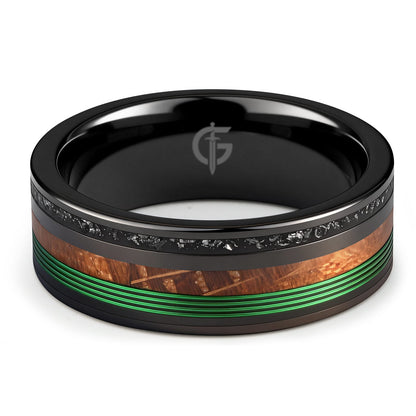 Polished black tungsten carbide ring with green fishing line, brown whiskey barrel wood and silver-gray meteorite