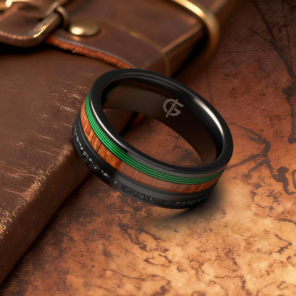 Polished black tungsten carbide ring with green fishing line, brown whiskey barrel wood and silver-gray meteorite