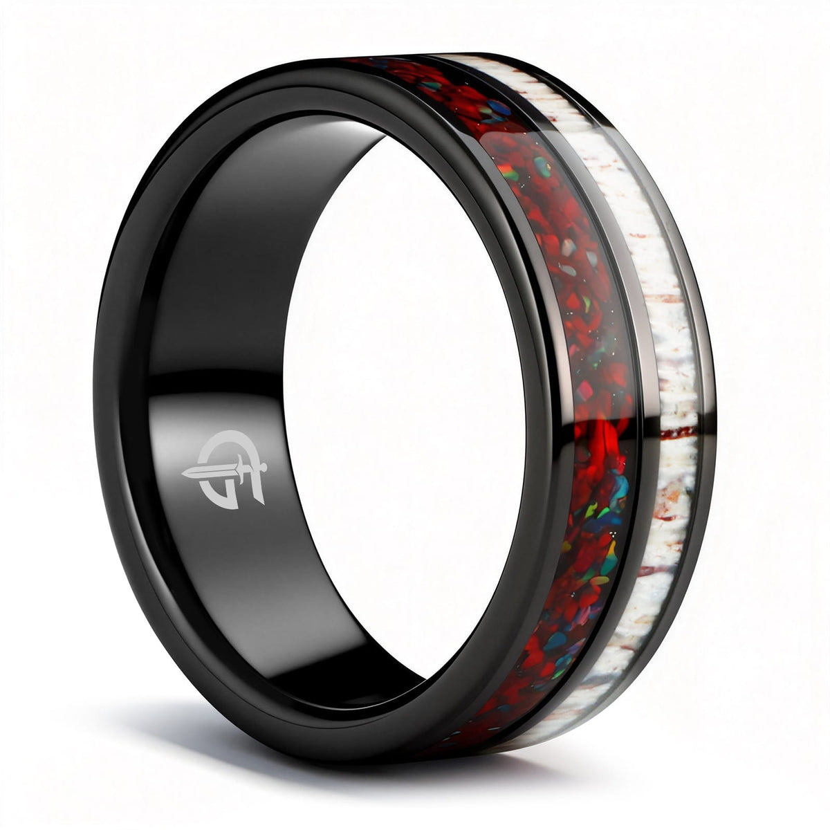 Polished black tungsten ring with pale deer antler beside red dinosaur bone and multicolored natural opal