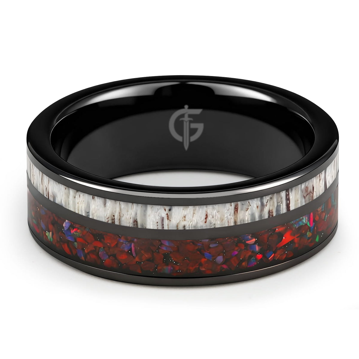 Polished black tungsten ring with pale deer antler beside red dinosaur bone and multicolored natural opal
