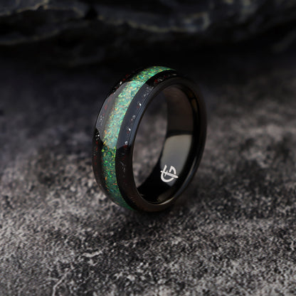 Black tungsten ring with green-yellow natural opal center and red and silver-gray inlays on both sides