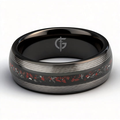 Black tungsten ring with silver-tone fishing line flanking a red dinosaur bone and silver-gray meteorite center