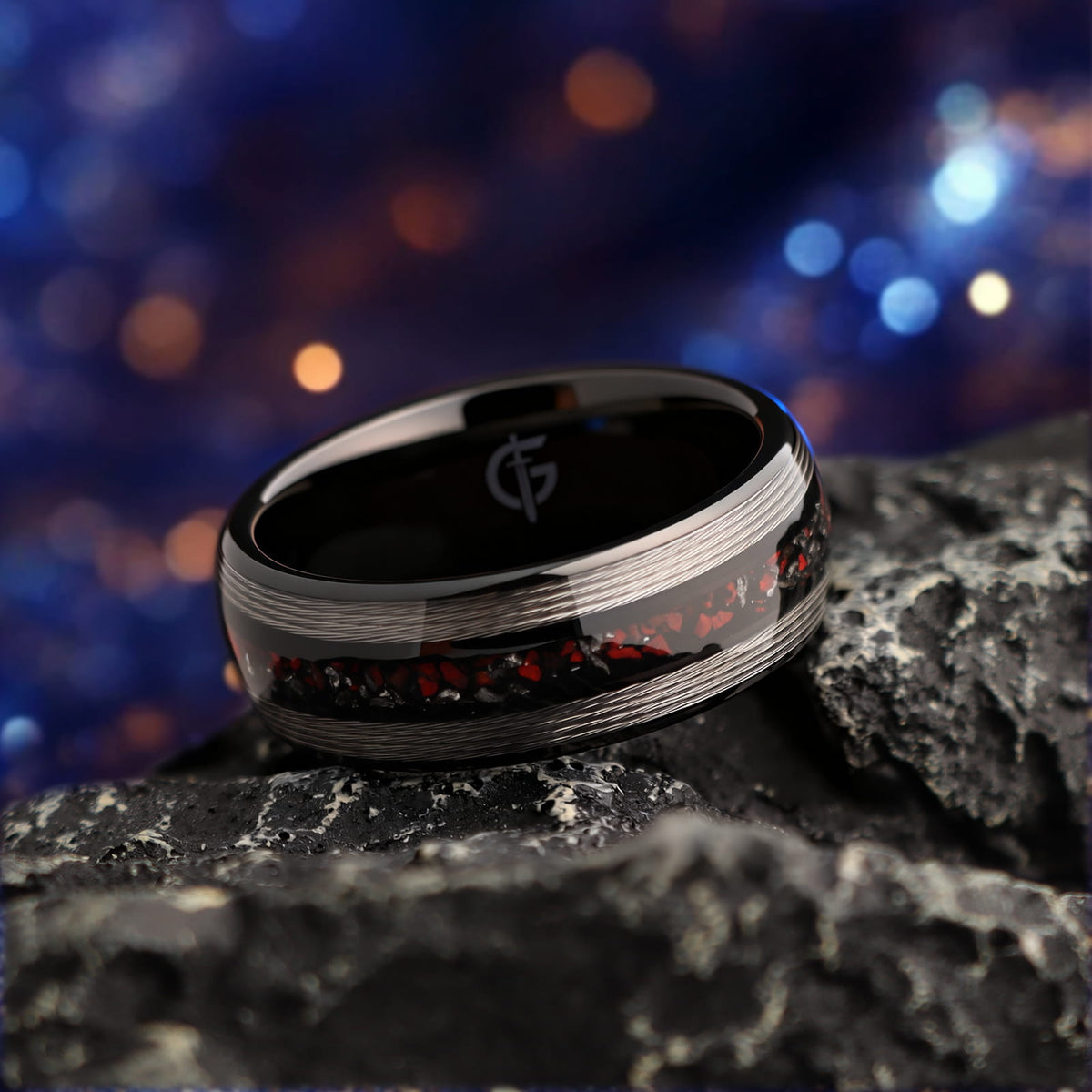 Black tungsten ring with silver-tone fishing line flanking a red dinosaur bone and silver-gray meteorite center