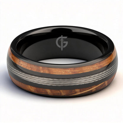 Black tungsten ring with silver-tone fishing line centered between two whiskey barrel wood bands